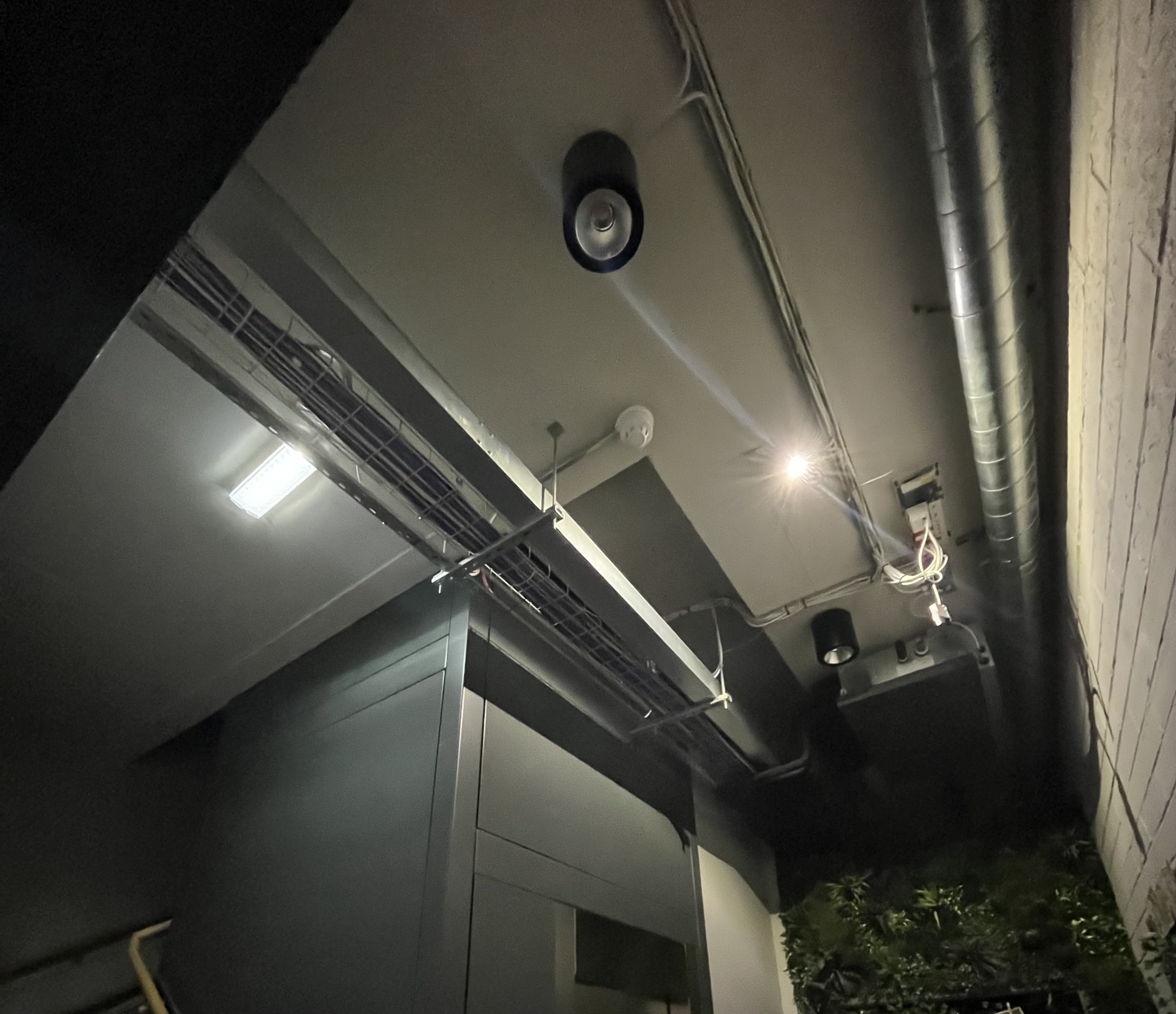 Emergency luminaires illuminated during an annual full rated duration test with mains supply isolated